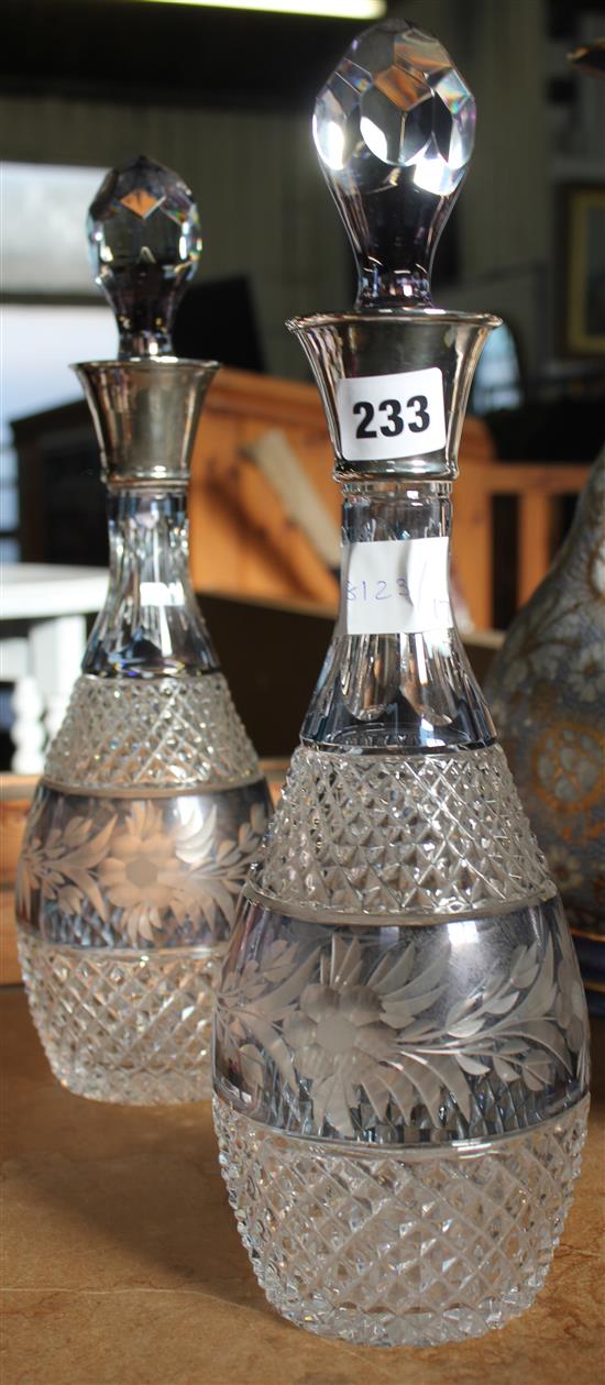 Pair silver mounted blue flash cut decanters